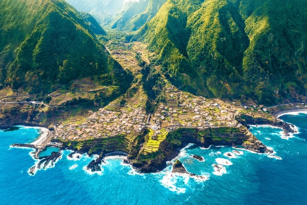 aerial-view-land-meets-ocean-600nw-2280373671